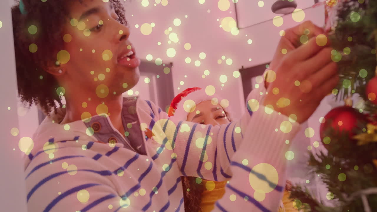 Decorating Christmas tree, people using festive lights and enjoying holiday season