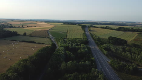 aerial view of highway through farmland