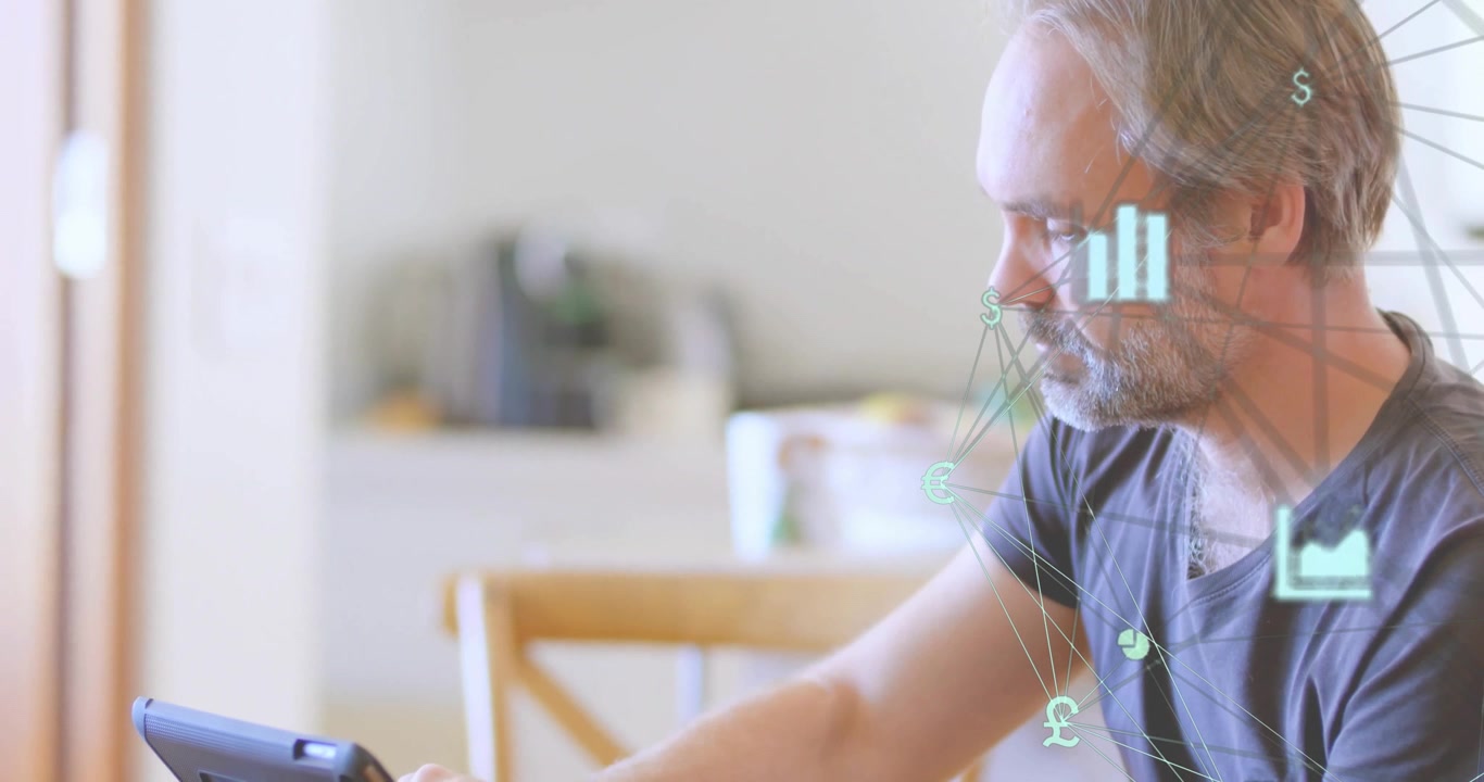 Man powering tablet, tapping tablet, generating currency icons and charts during finance analysis