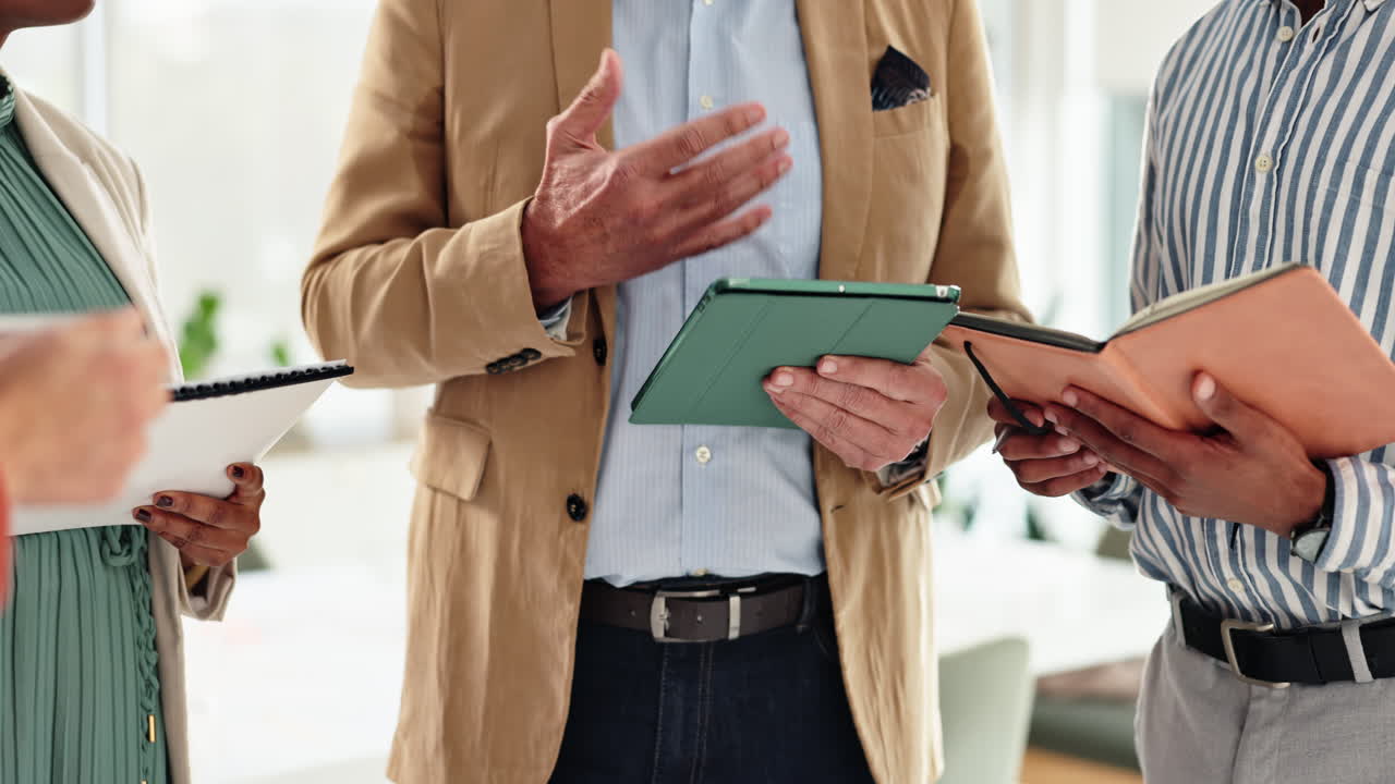 Business Meeting with Tablet and Notebook