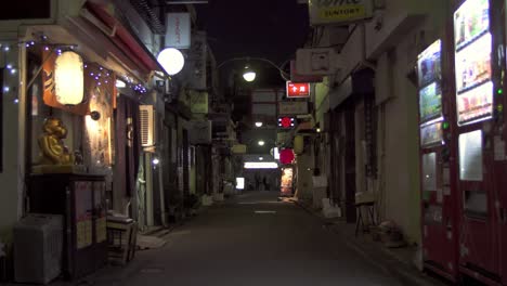 narrow japanese alleyway at night