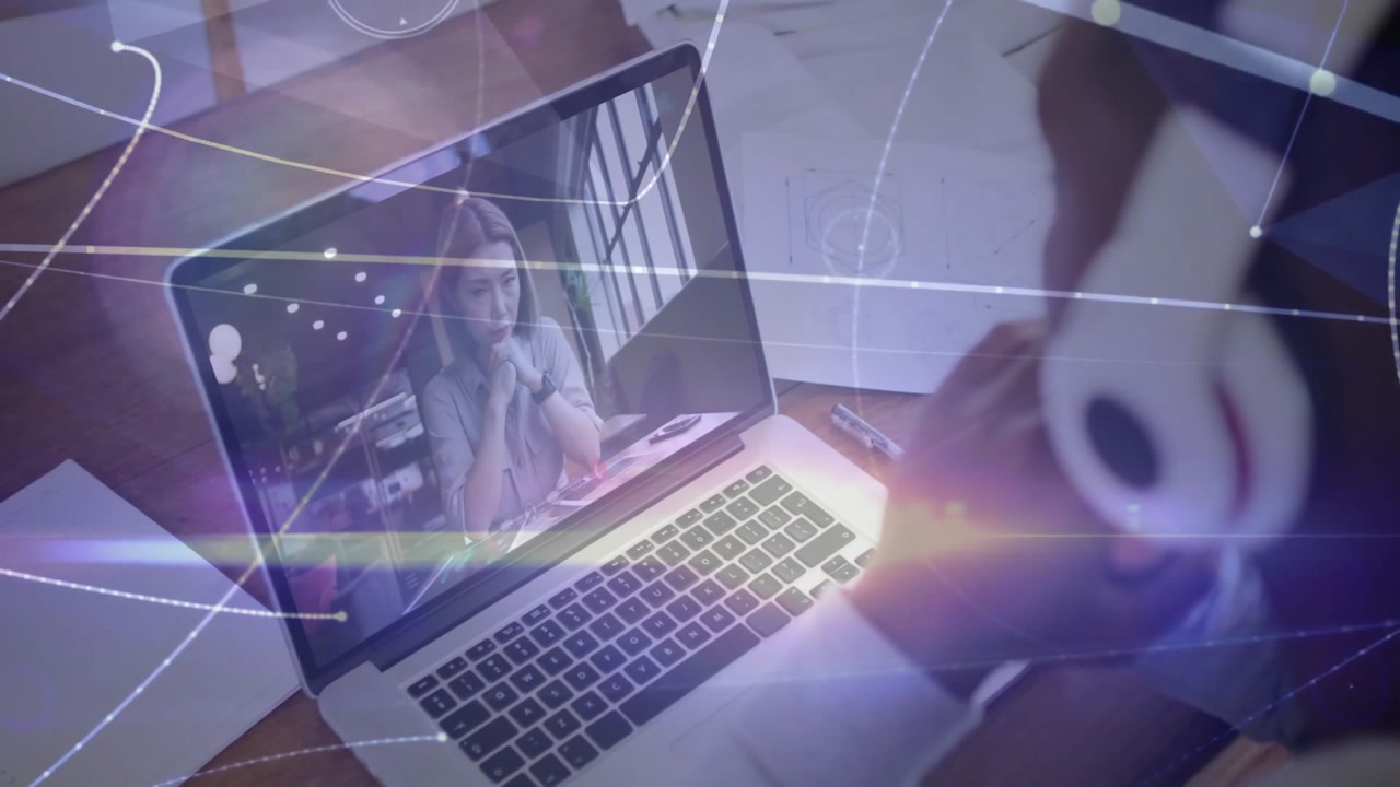 Man tuning headset in remote tech meeting as woman reviewing papers activating animated overlays