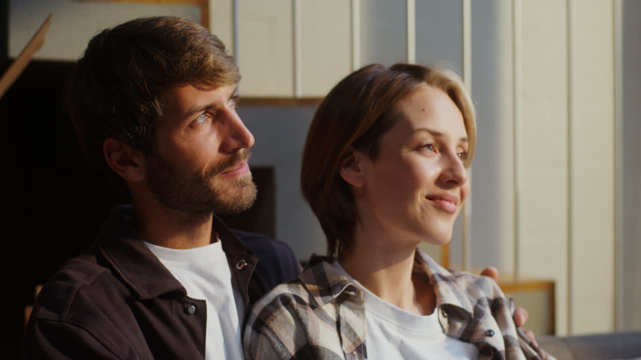 Happy Couple Relaxing at Home