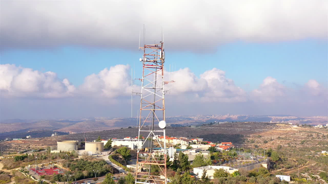 Aerial footage Close to Radio and cellular Antenna With blue sky