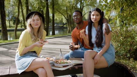 young friends posing outdoors