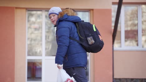 boy walking to school