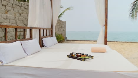 massage products over a beach bed