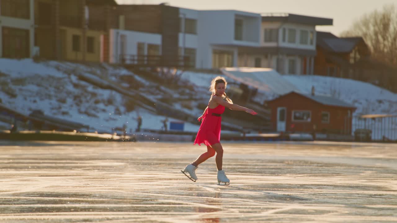 Woman Ice Skating on Frozen Lake