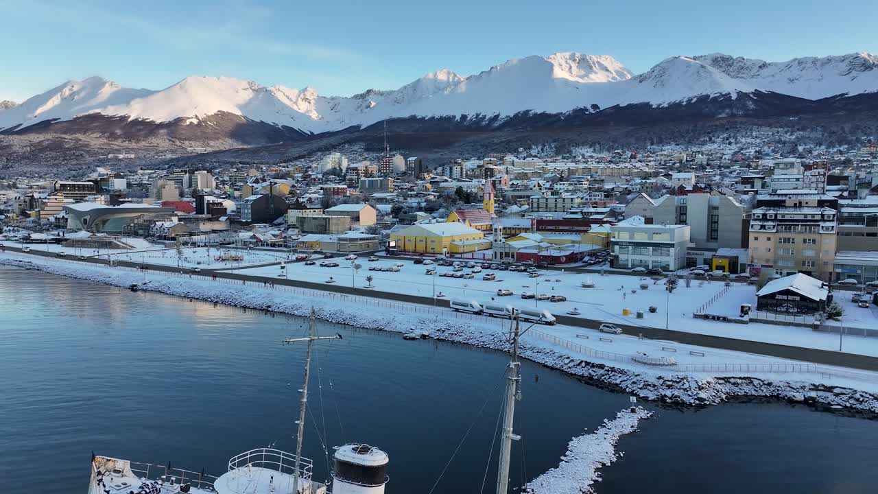 Aerial View of Snow Covered City with Shipwreck