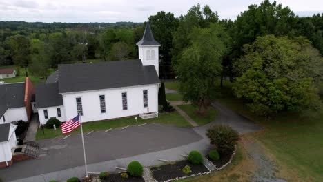 american flag flys outside small church in farmington nc, north carolina not far from winston salem nc, north carolina, chapel, church, america, hometown, hometown american, small town usa, homeplace