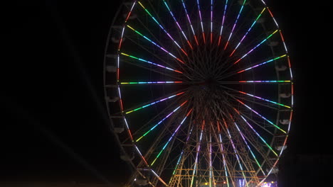 big wheel ride turning with pulsating lighting