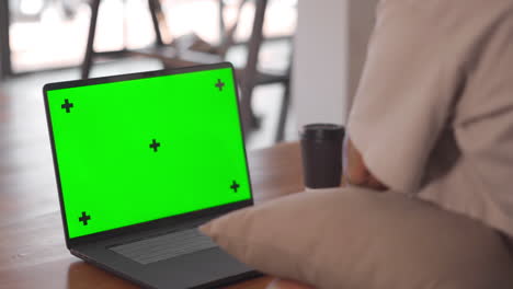 isolated green screen laptop and woman hands writing notes from video lessons webinar