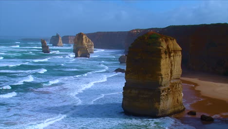 establishing shot of the 12 apostle rock formations along the great ocean road of victoria australia 4