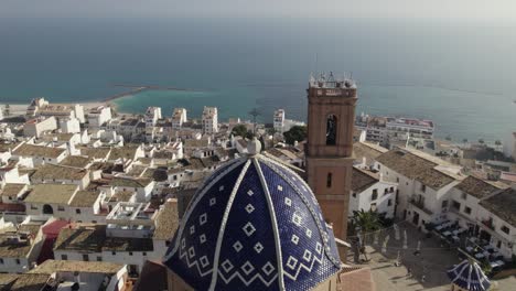 Aerial-Drone-Flyover-Coastal-Altea-Old-Quarter-Cathedral-And-Cityscape,-Spain