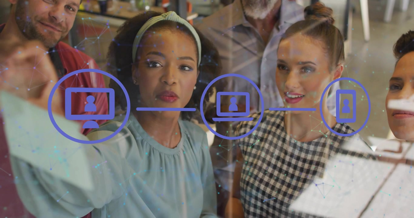 Presenter stepping forward sketching icons on board forming into red hologram in tech workflow