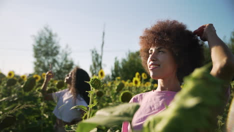 women in a sunflower field