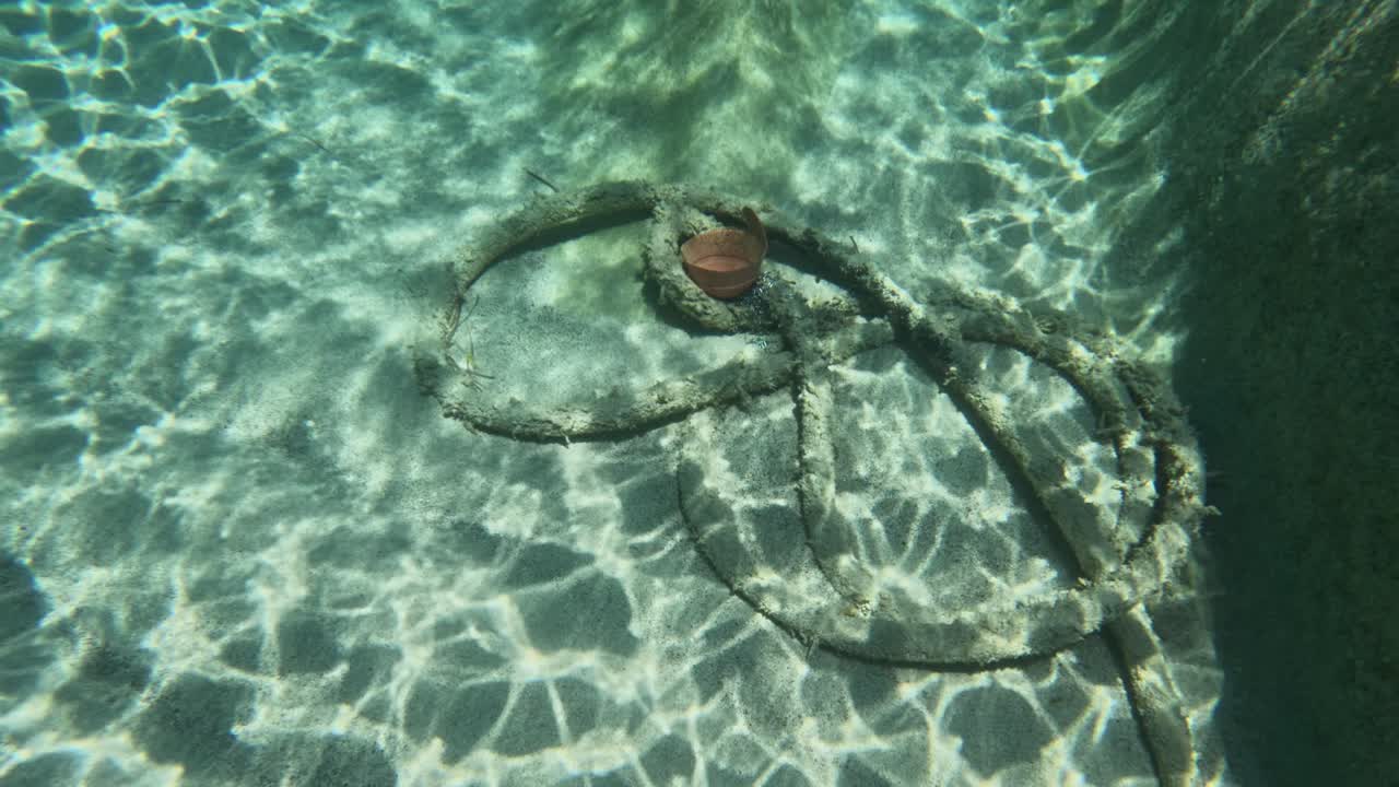 Old Rope Underwater Of A Clear Mediterranean Sea During A Scuba Dive