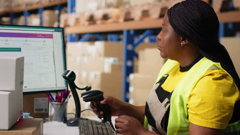 staff member managing barcodes awb scanning tasks for online shopping orders