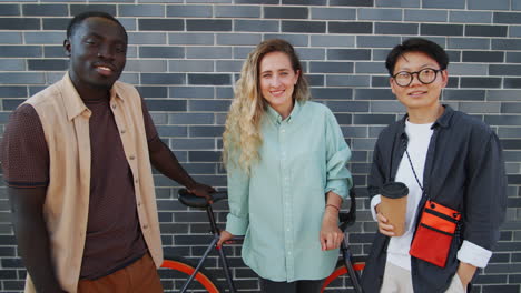 portrait of cheerful multiethnic friends on street