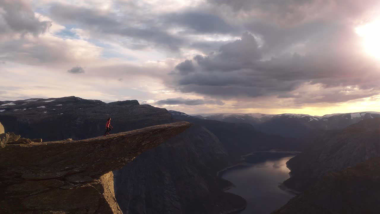 Stunning norwegian mountains with dramatic skies and peaceful landscape, aerial view, Trolltunga
