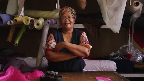 Mixed-race-woman-working-at-a-hat-factory