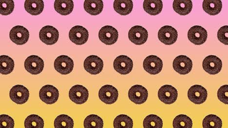 abstract colorful animation - donuts with chocolate moving to the side on pink-yellow gradient background - seamless loop. bakery and food concept