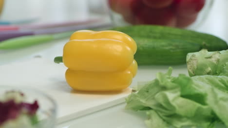 pepper lying on cutting board. closeup natural ingredients for cooking salad