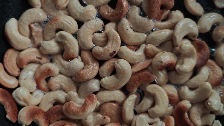 Ultra Cinematic Slow Motion Cashew Roasting in Black Pan with Olive Oil Sparks, Macro Food Art Close-Up, Crunchy Golden Transformation, Gourmet Kitchen ASMR Visual Feast 4K HDR Viral Stock Footage NOW