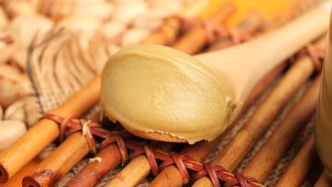 cashew butter on wooden spoon