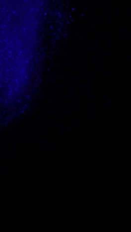 colorful glitter particles explosion vertical super slow motion