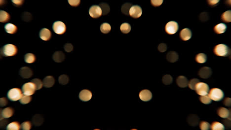 Bokeh-Leuchtende-Bunte-Partikel.-Schimmernde,-Glitzernde-Partikel-Loop-Animation-Mit-Schwarzem-Hintergrund