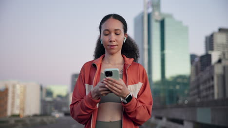 city, fitness and woman with a cellphone