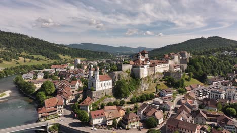 aerial view of aarburg castle, church, and town along the aare river in solothurn, switzerland