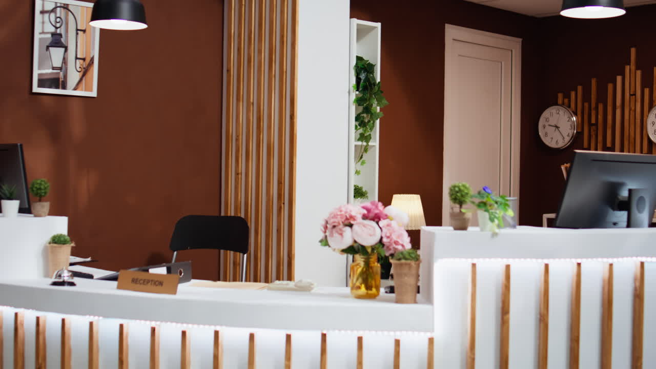 Empty hotel reception entryway with glamorous decorations