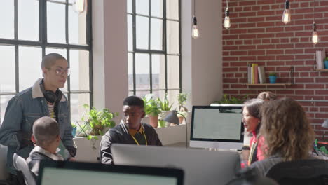 young-business-people-meeting-mixed-race-team-leader-man-using-tablet-computer-showing-creative-project-ideas-on-screen-sharing-strategy-colleagues-collaborating-in-office-briefing