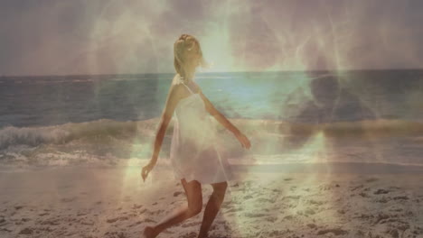 dancing with glowing light effects, child in white dress on beach