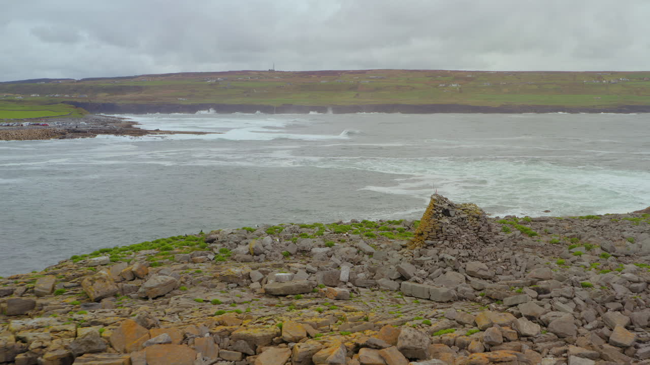 Slow motion tracking shot of the historic Irish Constabulary outpost at Crab Island, Dingle, Ireland