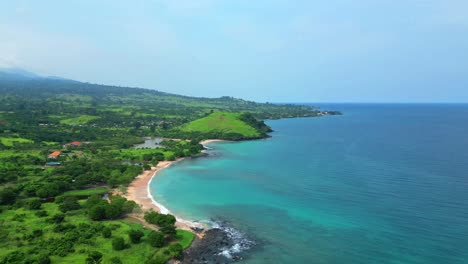 aerial view from tamarindos beach in sao tome,africa. backwards drone shot