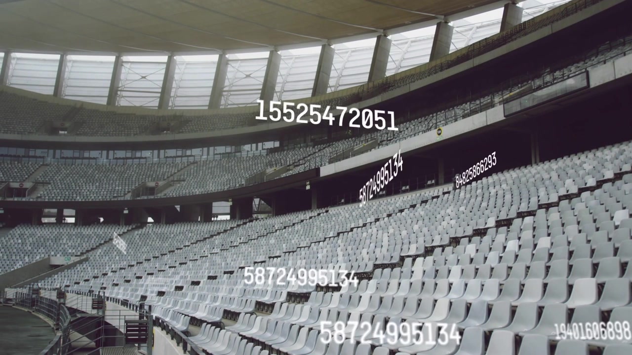 Empty stadium seating showing floating numeric overlays from frame two, shifting, fading for data