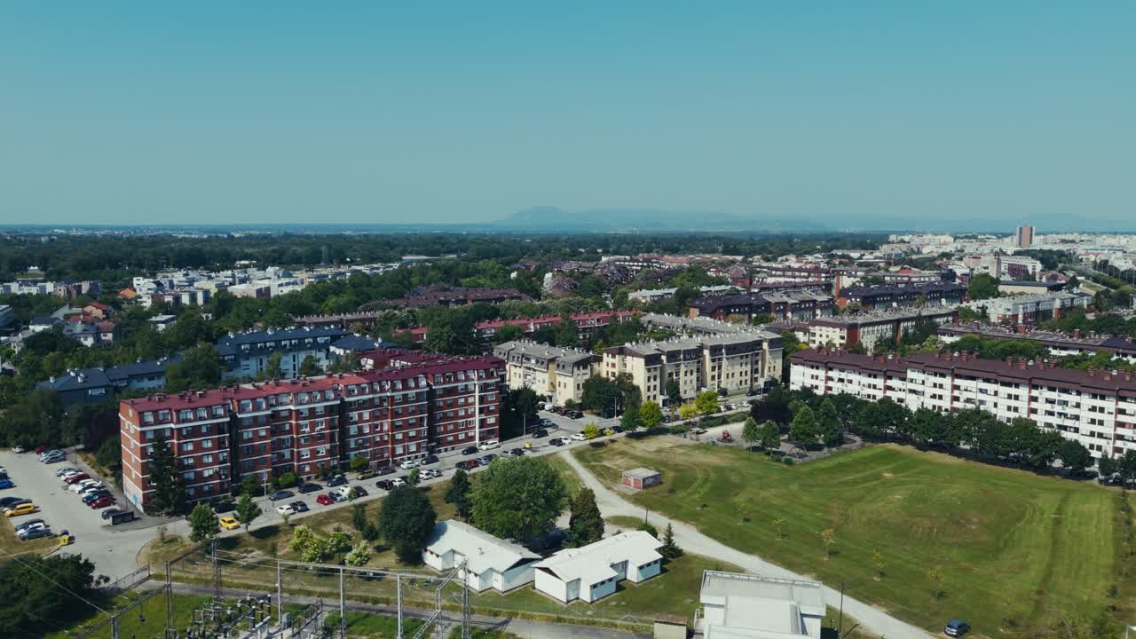 aerial - urban rooftops and power station in a residential area of Zagreb Croatia in summer