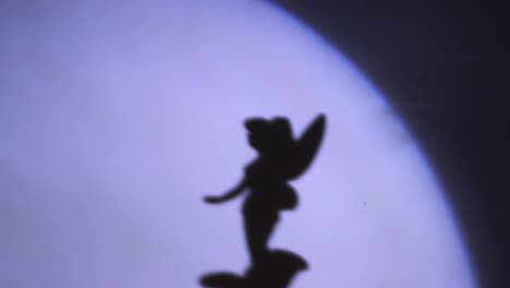 The-shadow-falls-from-a-dancing-wandering-fairy-on-a-screwed-musical-box