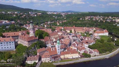 Amazing-aerial-top-view-flight-castle-Czech-Republic-historical-Cesky-Krumlov-Vltava-river-in-summer-time-2023,-world-heritage-in-Bohemia