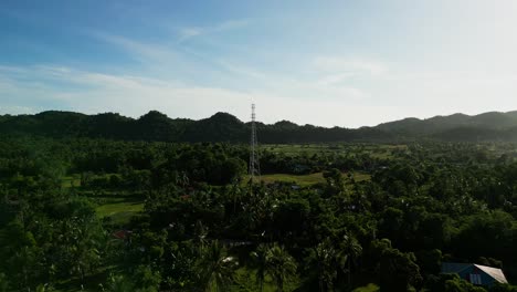 panoramic aerial view of a telecommunications satellite tower in middle of lush tropical forest during daytime at province catanduanes, philippines