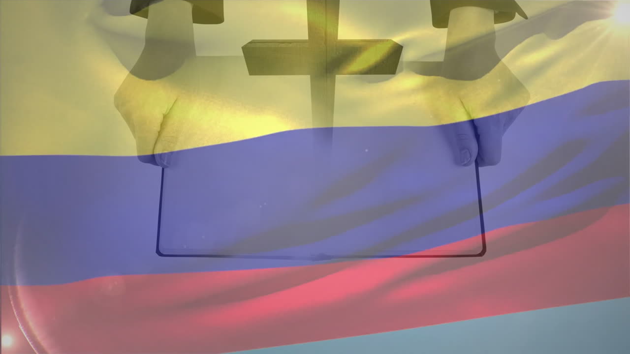 Holding tablet with animation of cross and Colombian flag in school setting