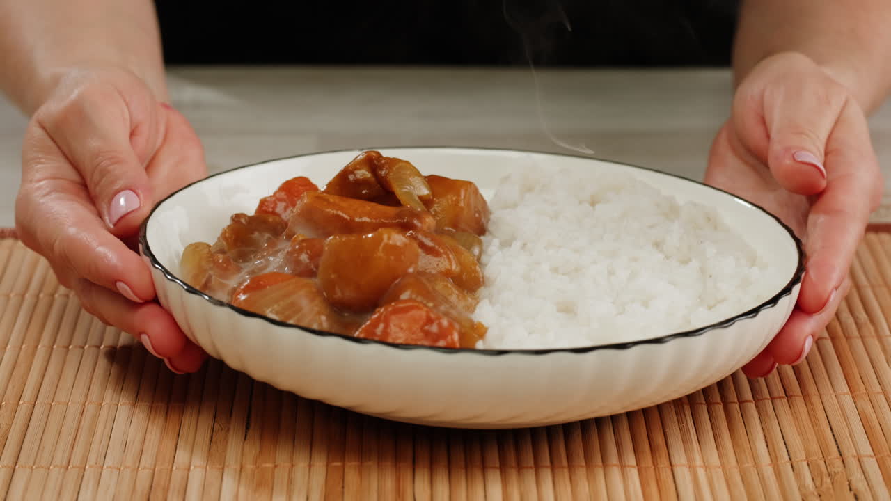 Japanese curry rice with fry pork Tonkatsu, Katsu Kare, Japanese breaded cooking dinner in restaurant, close up macro of asian food