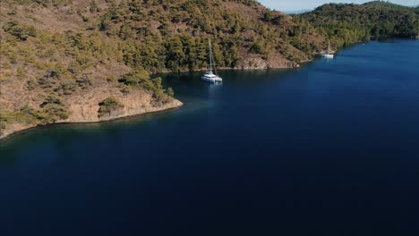 boats floating off the coast aerial