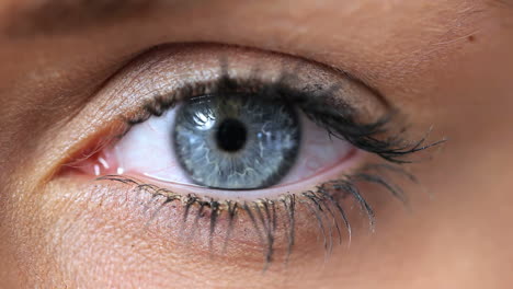 woman opening her eye
