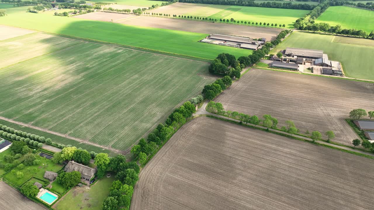 Flying over a farm in the countryside of the Netherlands