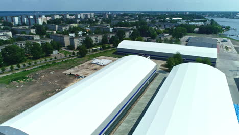 aerial view of industrial warehouses in a city