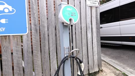 electric vehicle charging station with a parked van